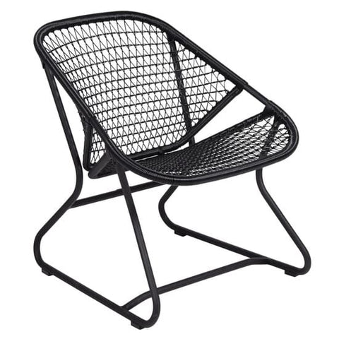 Fauteuil SIXTIES en ligne. Coin du Meuble